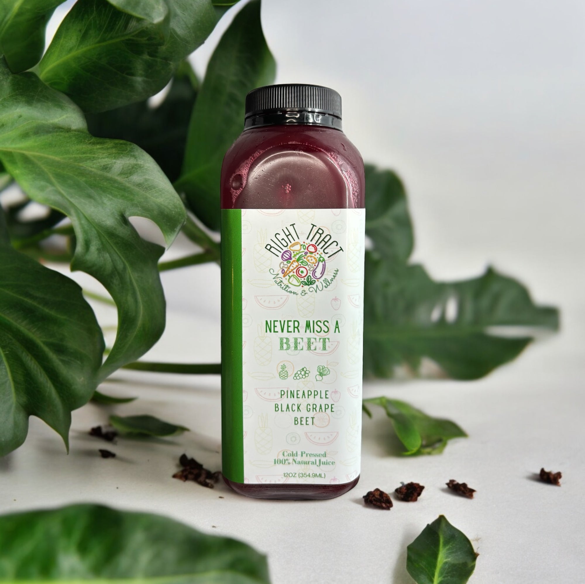 Bottle of juice with label "never miss a beet"